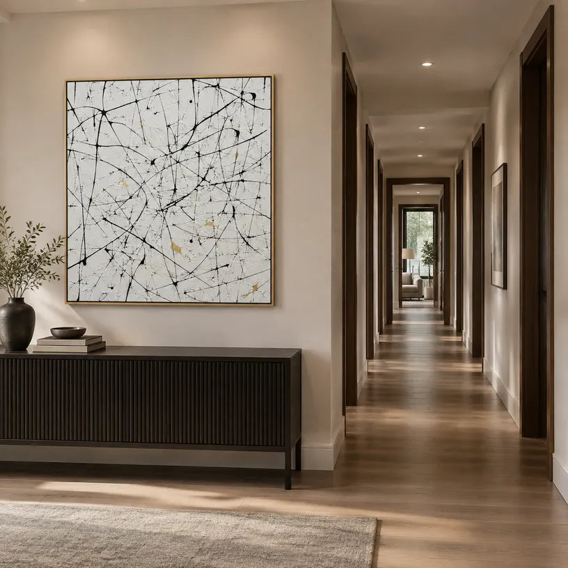 Abstract Expressionist abstract oil painting showing pale ground with black linear marks and small accents, contemporary wall art.