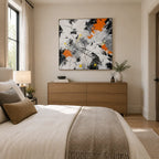 Abstract Expressionist abstract oil painting showing black, white and orange intersecting marks in a black palette, contemporary wall art.