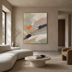 Abstract Expressionist abstract oil painting showing pale grey, white and orange layered brushwork in a grey palette, contemporary wall art.